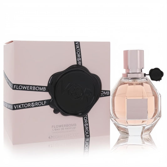 Viktor & Rolf Flowerbomb 1.7 oz EDP. Iconic pink grenade-shaped bottle with rose gold cap and elegant blush box.