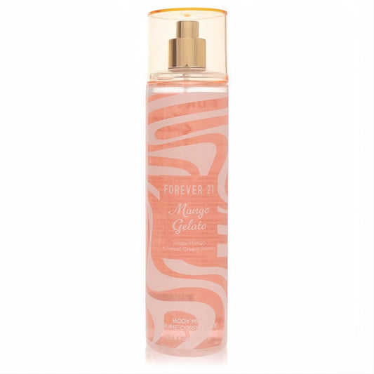 Forever 21 Mango Gelato 8 oz women's body mist. Clear bottle with tropical peach liquid, playful wavy design, and gold sprayer.
