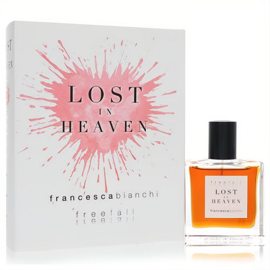 Francesca Bianchi Lost in Heaven 1 oz extrait de parfum. Amber liquid in a chic bottle, with its striking white box and pink splatter design.