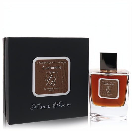 Franck Boclet Cashmere 3.3 oz unisex EDP. Elegant clear glass bottle with warm amber liquid and sleek black box.