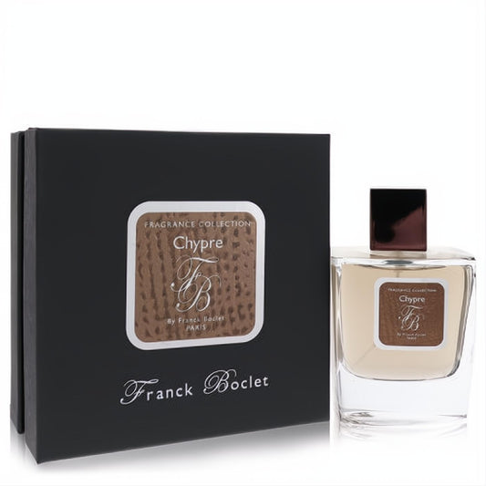 Franck Boclet Chypre 3.4 oz Eau De Parfum. Elegant clear glass bottle with amber liquid, bronze cap, and black gift box.