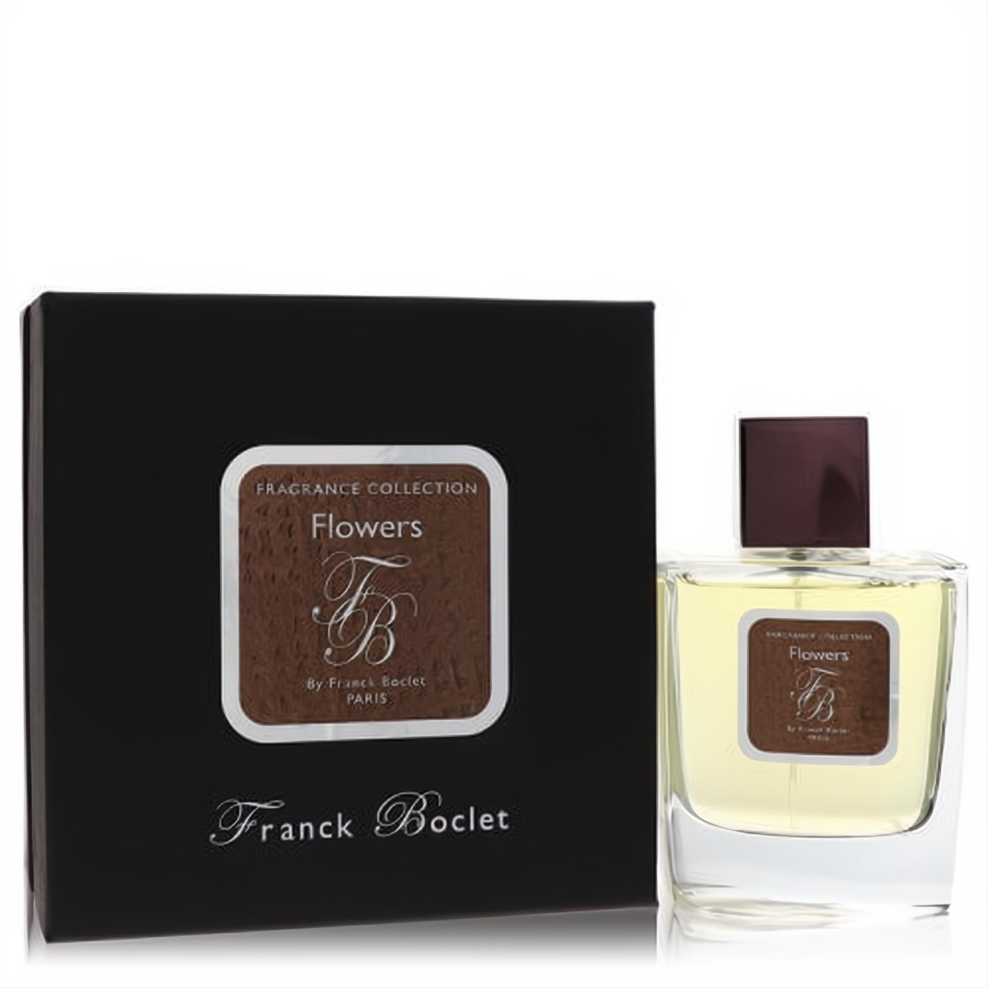 Franck Boclet Flowers 3.3 oz unisex EDP. Luxurious clear bottle with golden liquid, dark cap, and chic black box.
