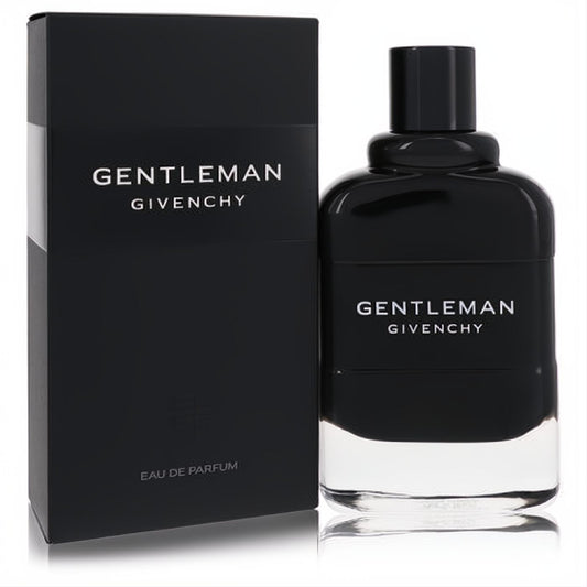 Discover Givenchy Gentleman Eau De Parfum. Sleek black bottle with clear base and matching box, featuring crisp white branding.