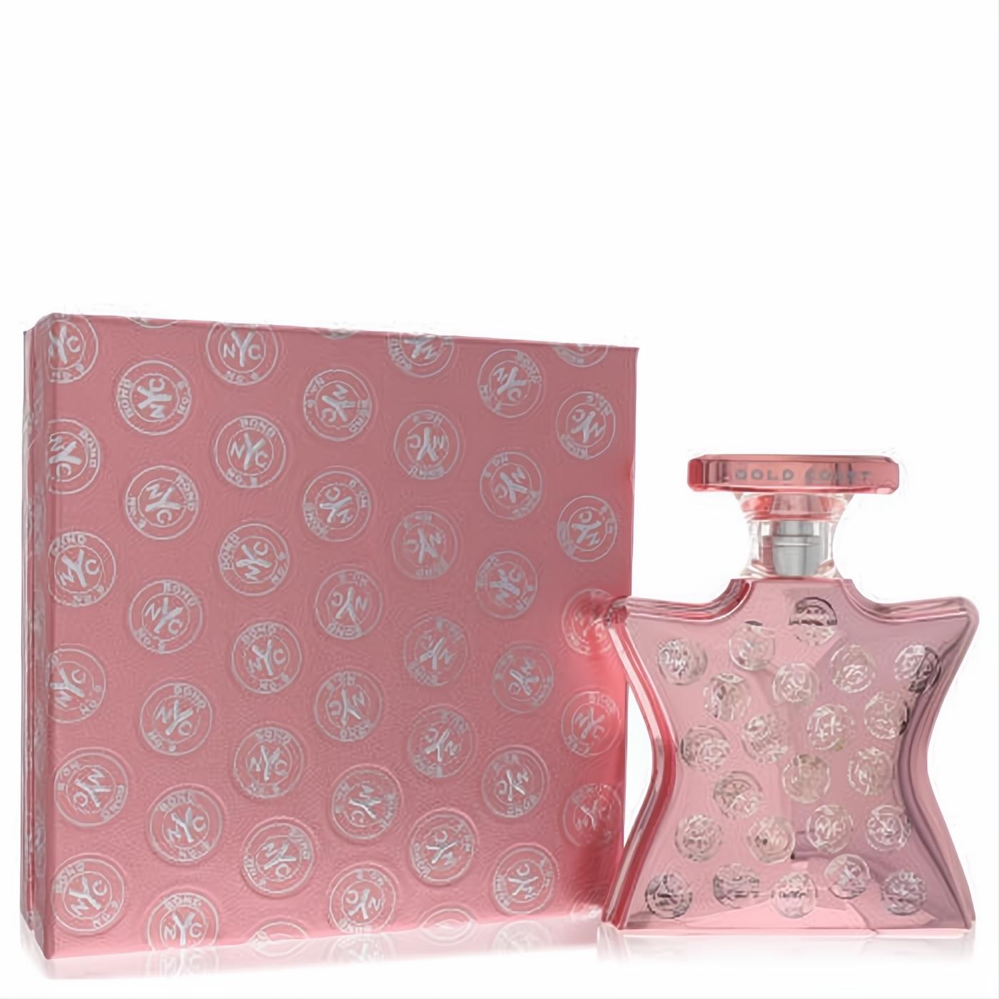 Luxurious Bond No. 9 Gold Coast rose gold perfume in its iconic star-shaped bottle with embossed logos, beside its matching box.
