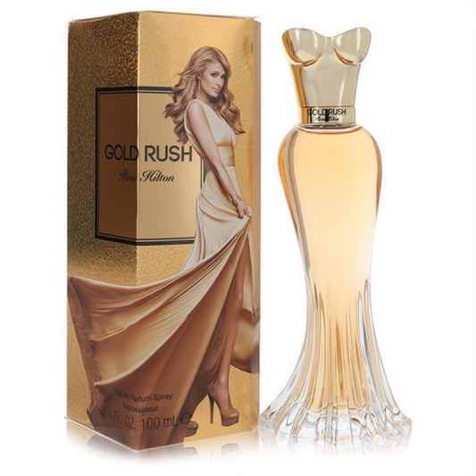 Luxurious Gold Rush Paris Hilton 3.4 oz EDP in an elegant gold dress bottle with amber liquid, beside its shimmering golden box.
