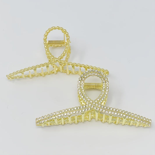 Golden Gem hair claw set: one with elegant cable texture, one dazzling with brilliant CZ stones. Glamorous hair accessories.