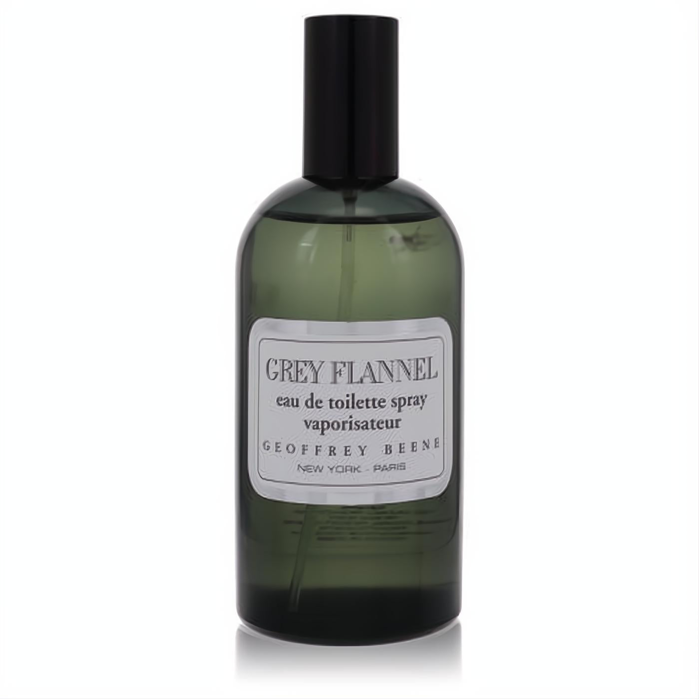 Classic Grey Flannel by Geoffrey Beene 4 oz men's fragrance. Dark green glass spray bottle with sleek black cap and elegant silver label.