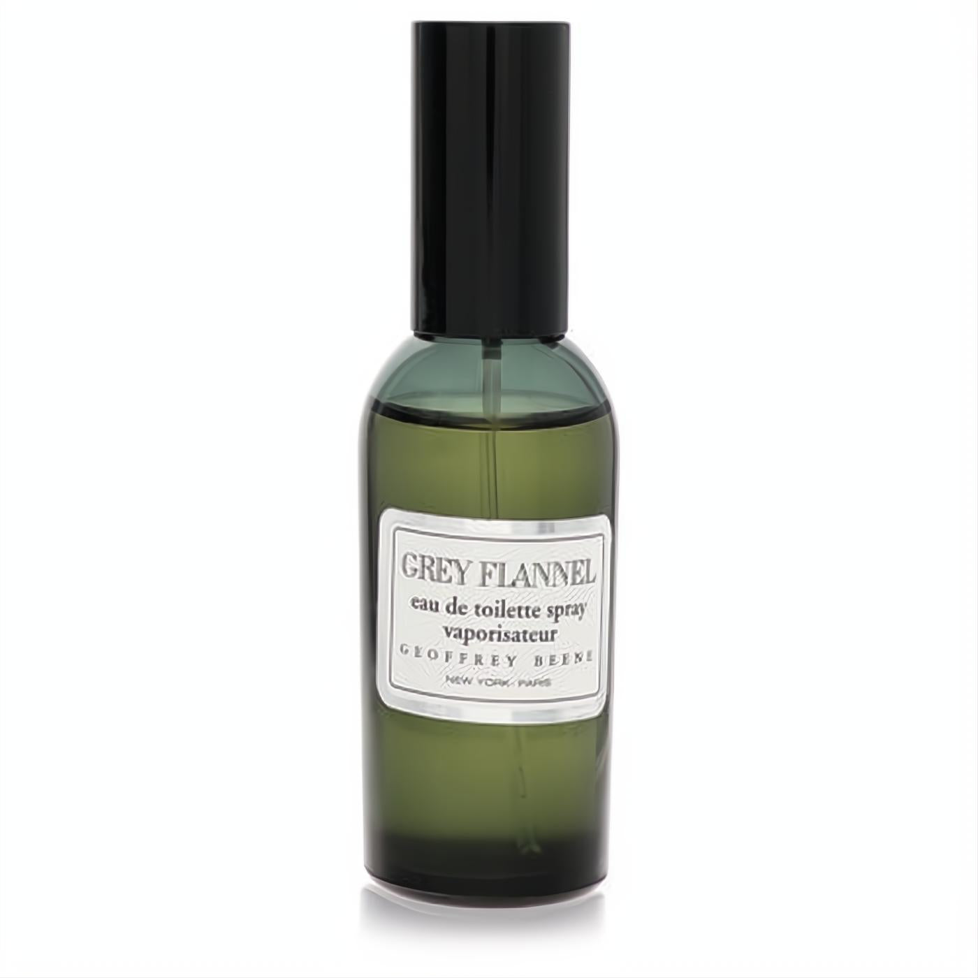 Sophisticated Grey Flannel by Geoffrey Beene EDT spray. Elegant dark green glass bottle, sleek black cap, and iconic white label.