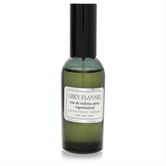 Sophisticated Grey Flannel by Geoffrey Beene EDT spray. Elegant dark green glass bottle, sleek black cap, and iconic white label.