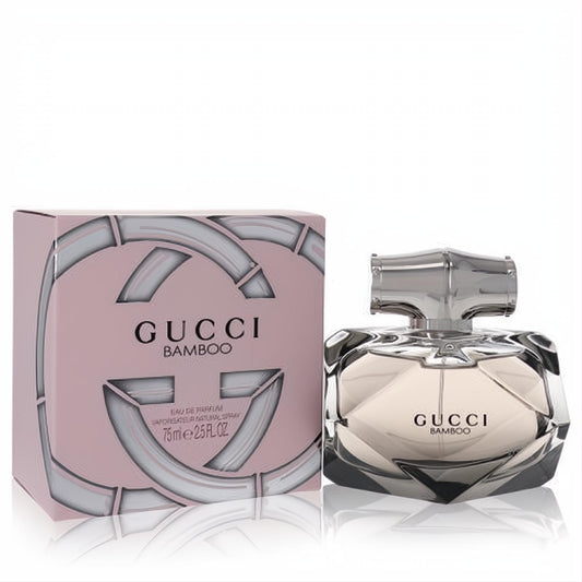 Gucci Bamboo 2.5 oz EDP. Elegant faceted glass bottle with a silver bamboo cap and a chic pink logo box.