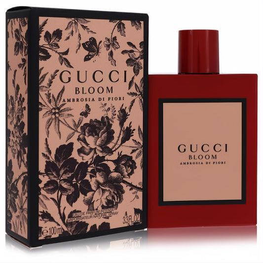 Gucci Bloom Ambrosia Di Fiori 3.3 oz intense perfume. Vibrant red glass bottle with peach label, next to its elegant black floral box.