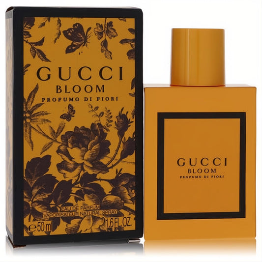Discover Gucci Bloom Profumo Di Fiori 1.6 oz EDP. Vibrant orange rectangular bottle and matching box with elegant black floral design.
