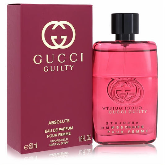 Gucci Guilty Absolute women's Eau De Parfum, 1.6 fl. oz. Vibrant pink bottle with black cap, beside an elegant maroon box.
