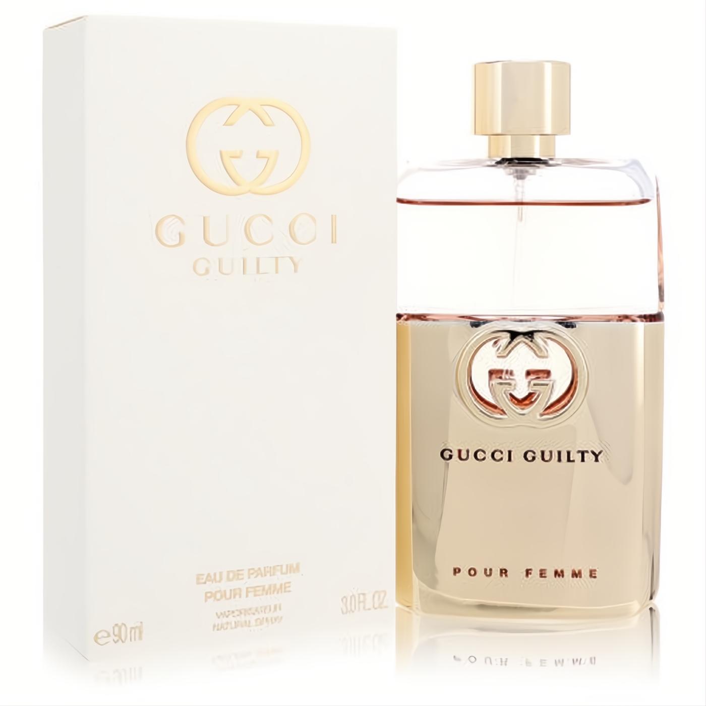 Gucci Guilty Pour Femme 3 oz EDP spray in a sleek gold and clear bottle with iconic GG logo, beside its elegant white box.