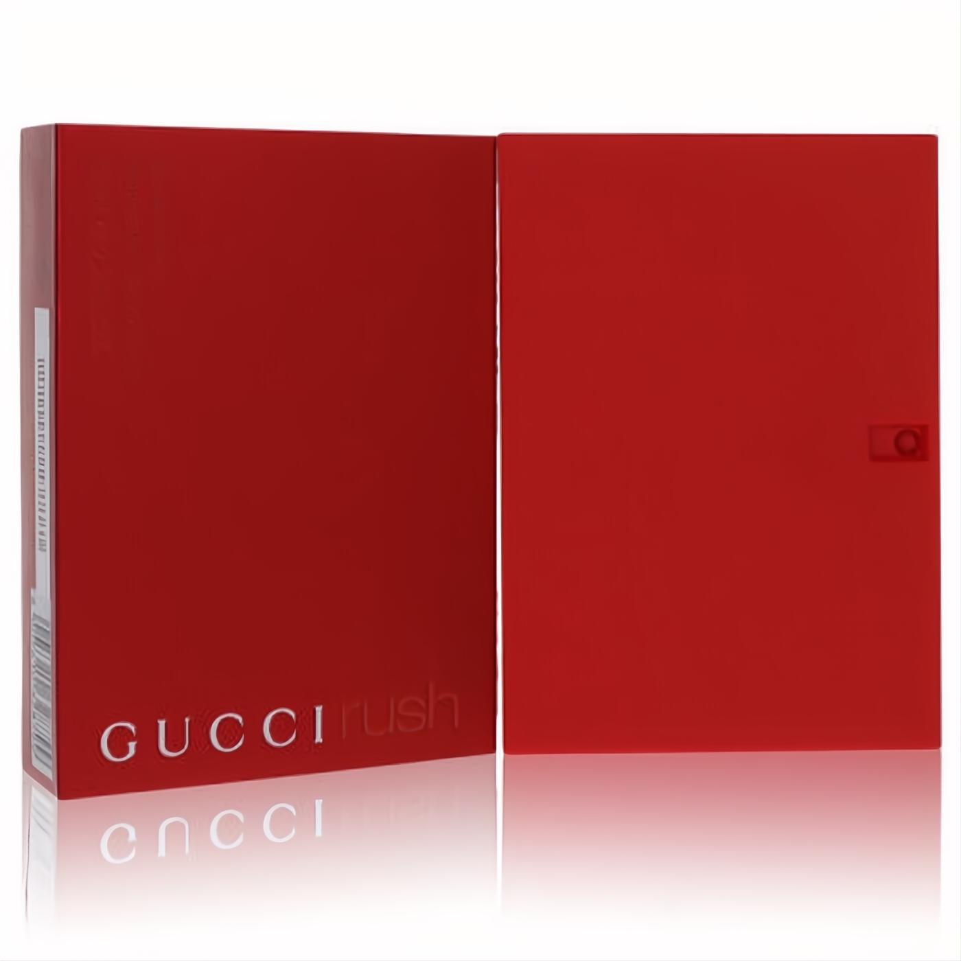 Bold red Gucci Rush Eau De Toilette 2.5 oz perfume box, featuring the iconic white logo, ready to captivate.