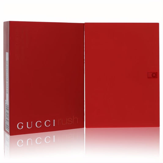 Bold red Gucci Rush Eau De Toilette 2.5 oz perfume box, featuring the iconic white logo, ready to captivate.
