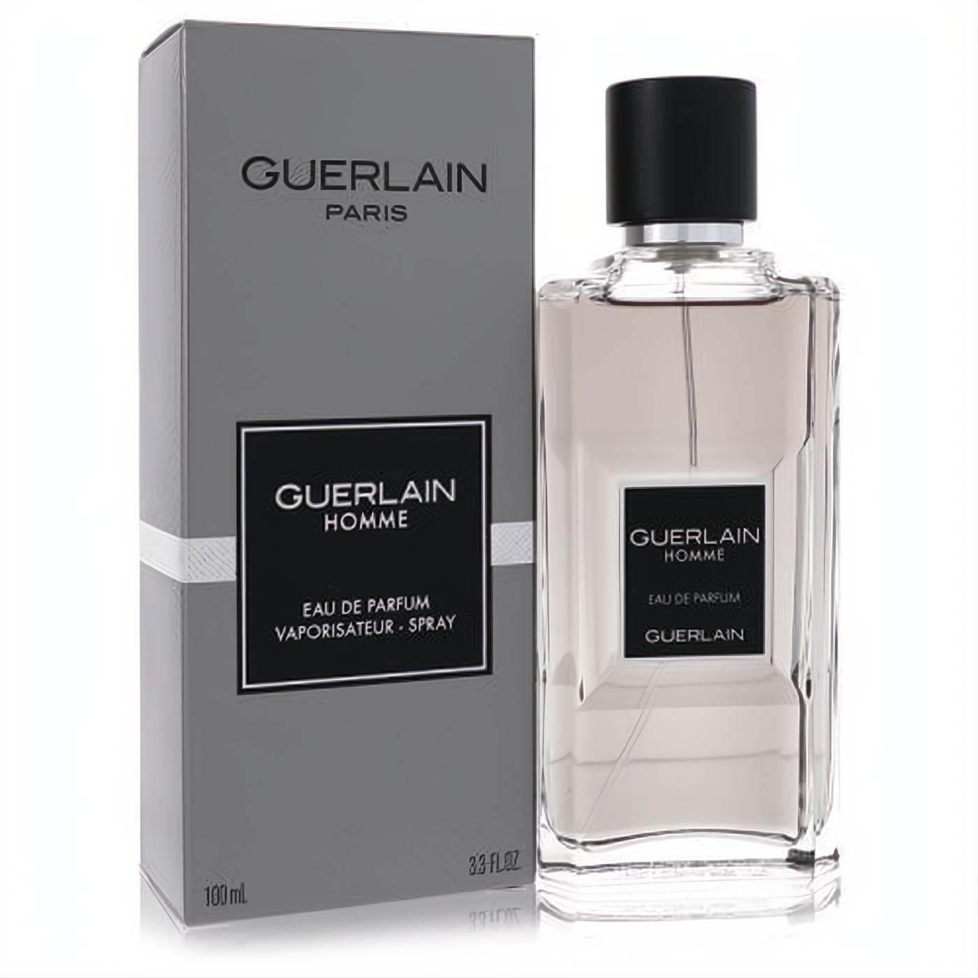 Sophisticated Guerlain Homme 3.3 oz Eau De Parfum for men. Clear glass spray bottle with black cap, beside its elegant grey branded box.