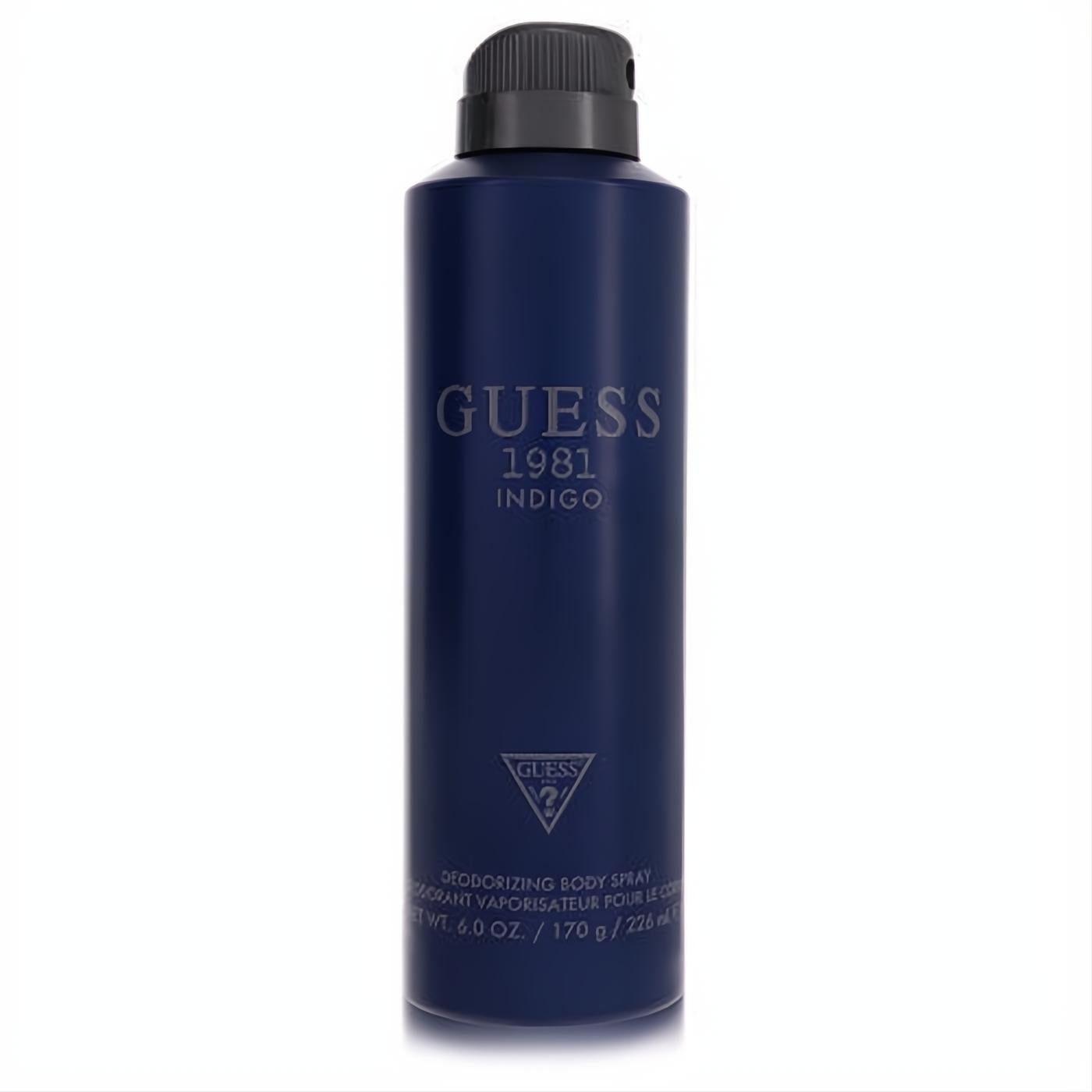Guess 1981 Indigo men's fragrance body spray, 6 oz. Sleek dark blue can with bold branding and black cap.