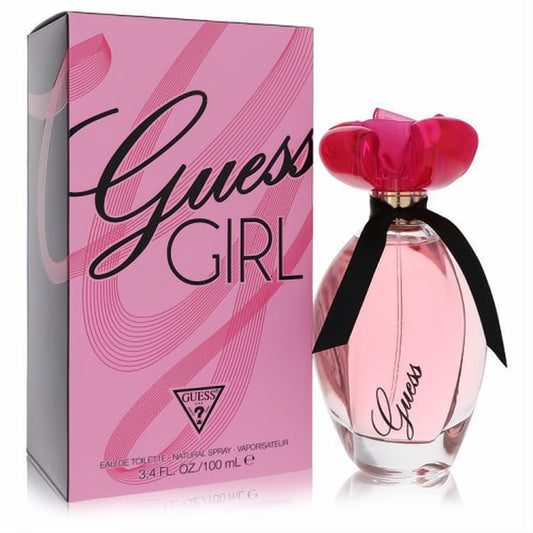 Guess Girl 3.4 oz Eau De Toilette: elegant pink bottle, fuchsia floral cap, black ribbon, and branded pink box.
