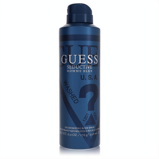 Sophisticated Guess Seductive Homme Blue 6 oz men's body spray. Sleek dark blue can with iconic white branding.