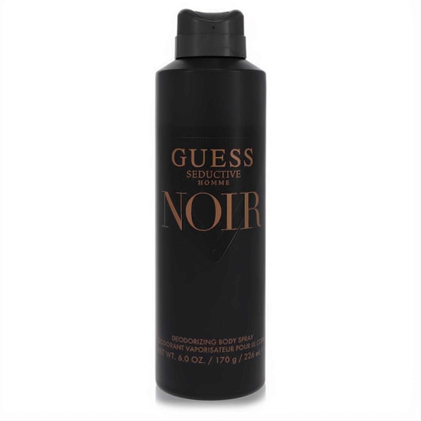 Guess Seductive Homme Noir 6 oz men's body spray. Sleek matte black can with elegant copper lettering, perfect for a sophisticated scent.