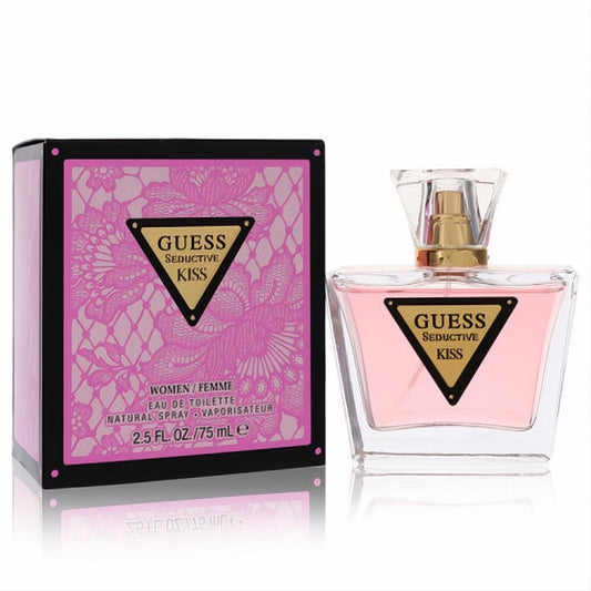 Seductive Guess Kiss 2.5 oz EDT for women. Pink perfume in a clear bottle with gold accents, paired with a matching lace box.