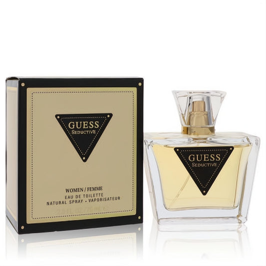 Guess Seductive 2.5 oz women's EDT. Luxurious clear glass bottle with gold accents, presented in a chic black and gold box.