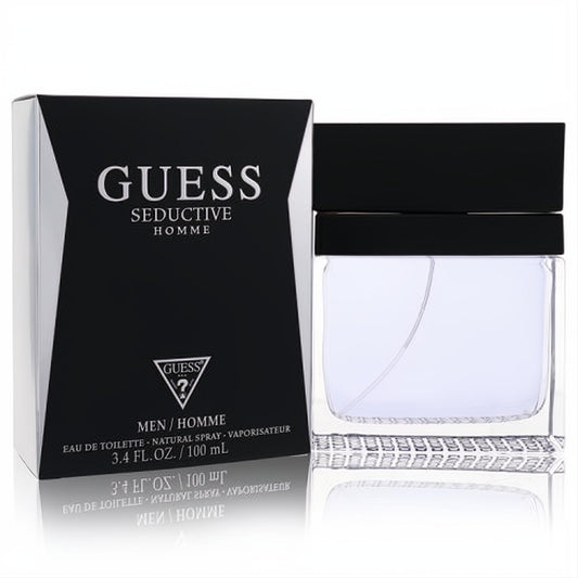 Guess Seductive Homme 3.4 oz EDT spray. Clear glass bottle with sleek black cap, paired with its bold black and white geometric box.