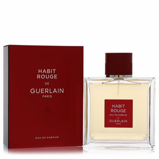 Guerlain Habit Rouge Eau De Parfum, 3.4 oz. Elegant clear glass bottle with amber liquid, bold red cap, and matching red box.