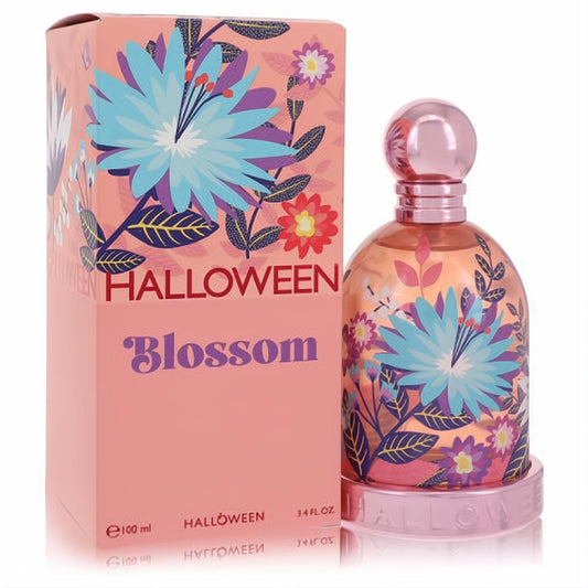 Captivating Halloween Blossom 3.4 oz EDT for women. Pink bottle and box adorned with vibrant blue, purple, and red floral art.