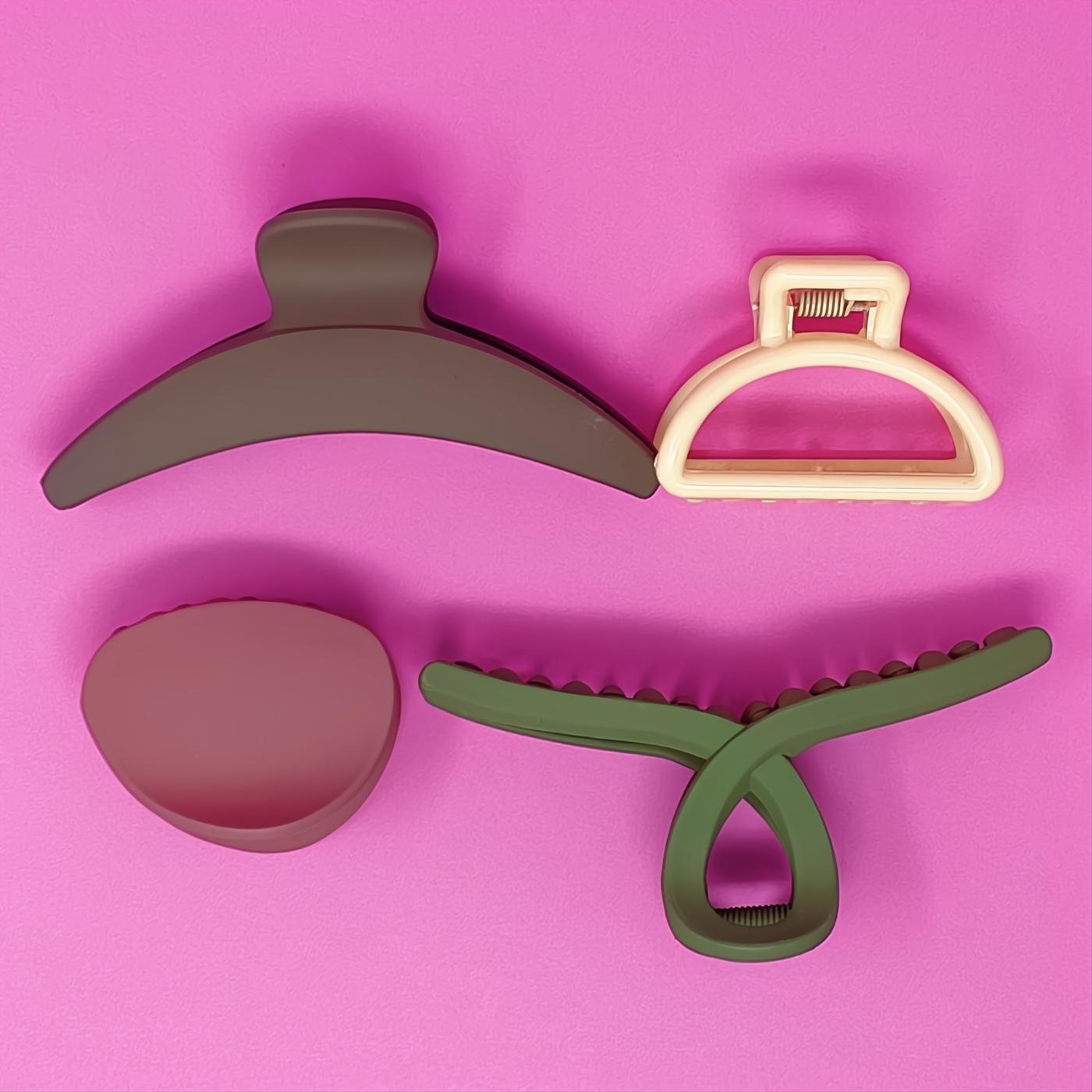 Chic 4-piece matte everyday hair claw set: neutral brown, cream, pink, and olive green in varied sizes and stylish shapes.