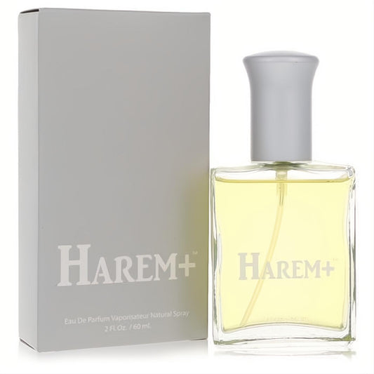 Harem Plus 2 oz Eau De Parfum in a clear glass bottle with golden liquid, modern silver cap, and elegant gray box.