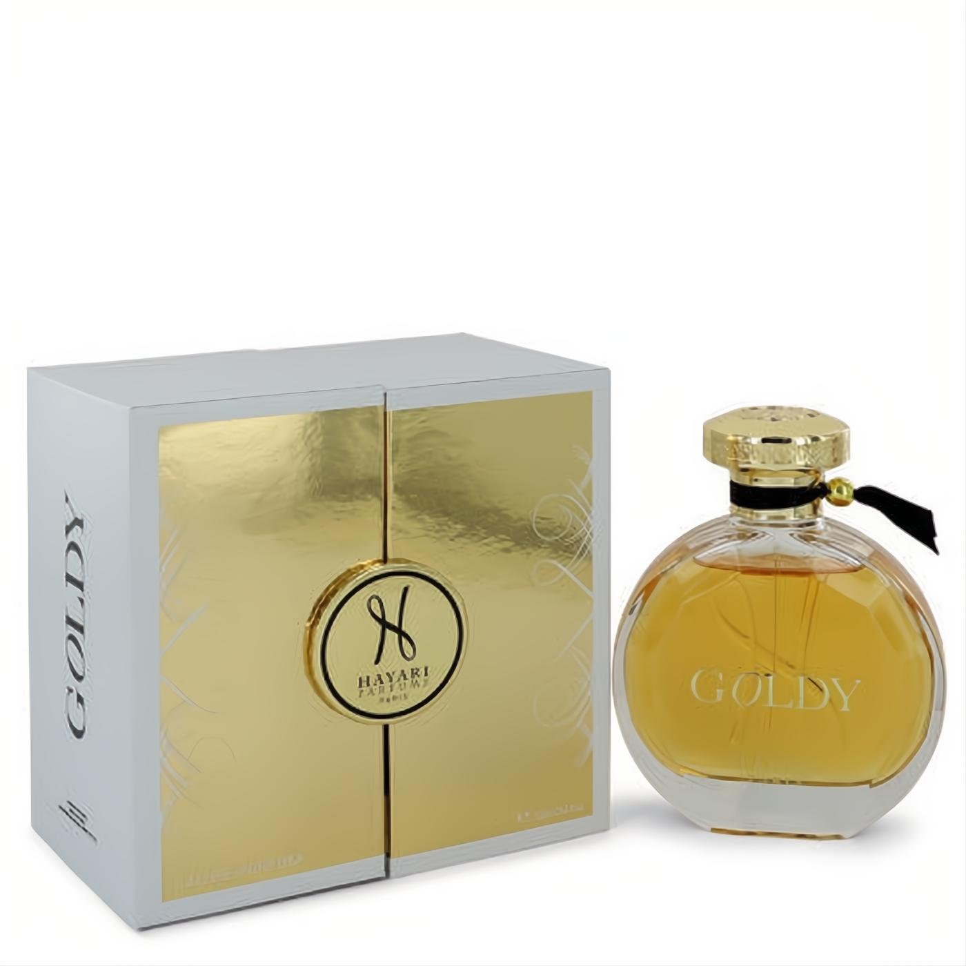 Luxurious Hayari Goldy Eau de Parfum. Stunning round glass bottle with golden liquid, gold cap, and elegant white & gold gift box.