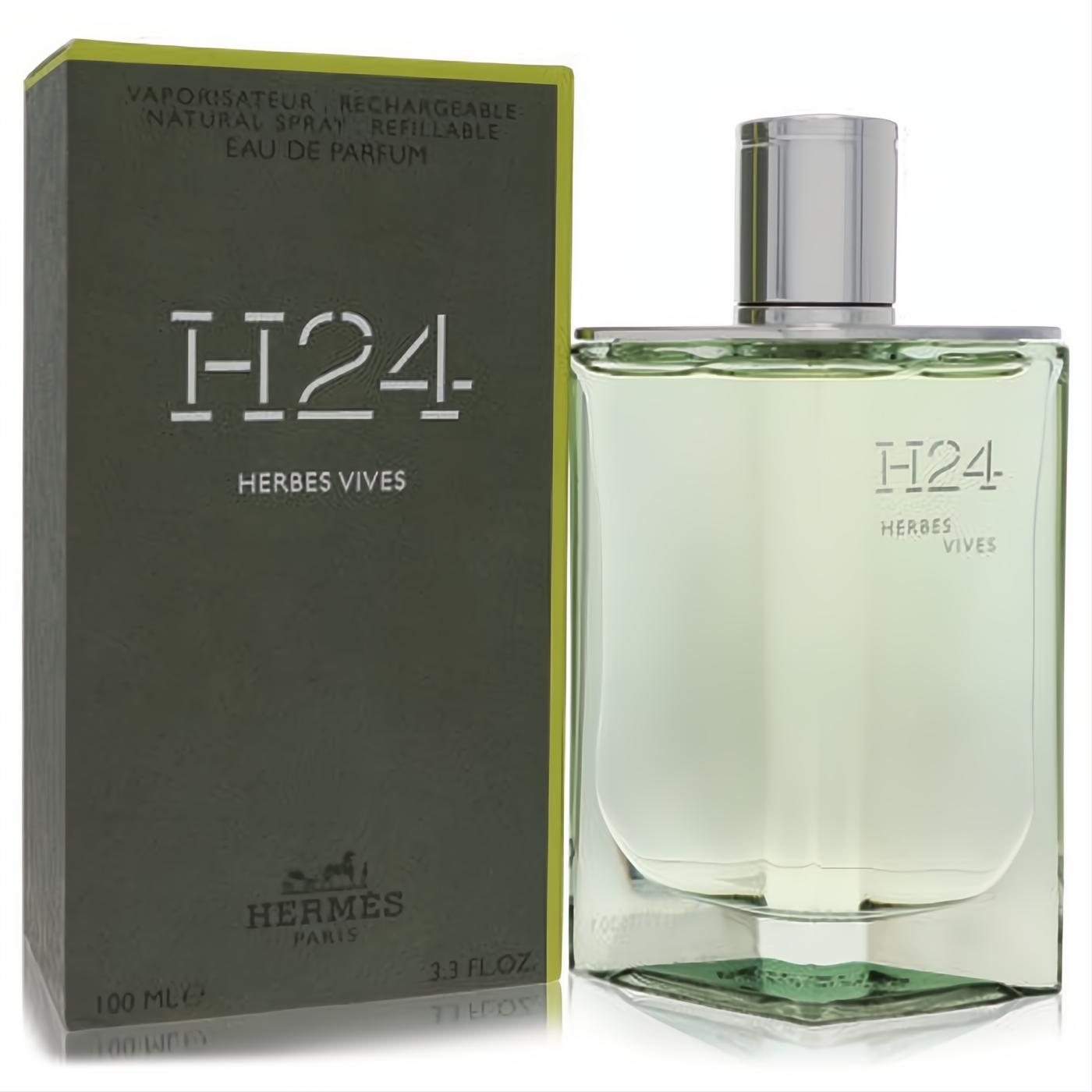 Hermes H24 Herbes Vives 3.4 oz refillable EDP. Sleek clear glass bottle with fresh green fragrance, silver cap, and matching olive box.