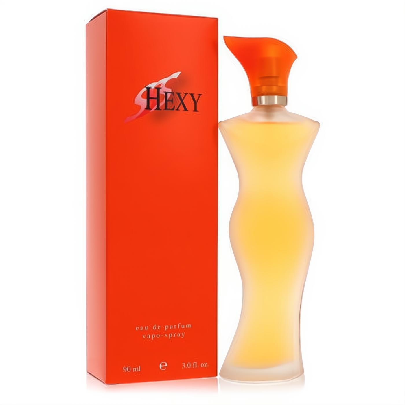 Hexy women's 3 oz Eau De Parfum spray. Frosted hourglass bottle, amber liquid, vibrant orange cap, and bold red-orange box.