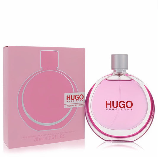 Hugo Extreme by Hugo Boss 2.5 oz women's EDP. Striking round pink glass bottle with silver cap, beside its sleek pink box.