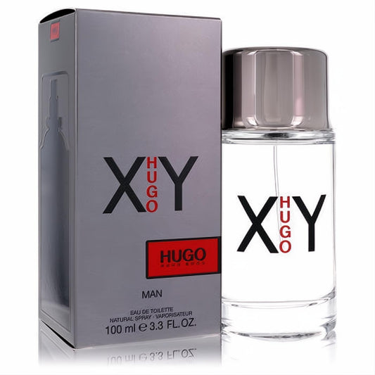 Sophisticated Hugo XY by Hugo Boss 100ml Eau De Toilette for men. Clear glass spray bottle with sleek silver cap, next to its modern gray box.