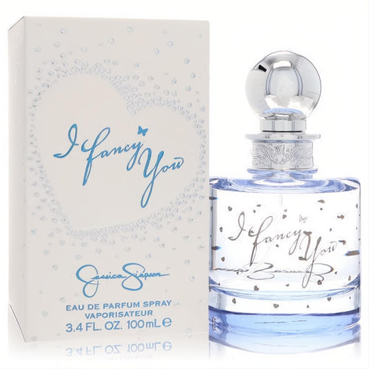 Jessica Simpson I Fancy You 3.4 oz EDP. Clear bottle with sparkling light blue fragrance, elegant silver cap, and romantic white box.