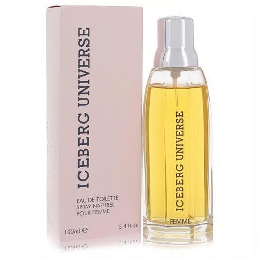 Iceberg Universe 3.4 oz EDT for women. Elegant clear glass bottle with golden fragrance, sleek silver cap, and a chic blush pink box.