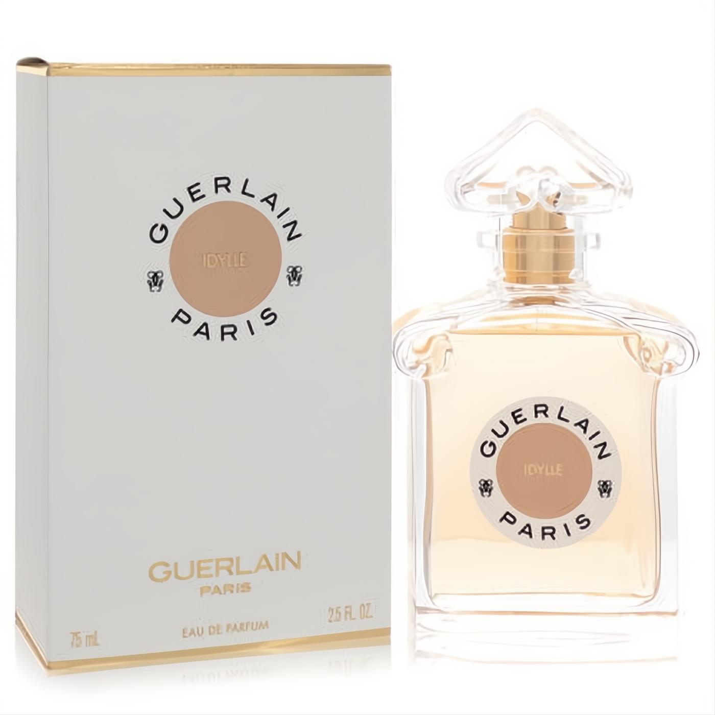 Guerlain Idylle 2.5 oz Eau De Parfum. Elegant clear glass bottle with golden liquid, faceted cap, and luxurious white & gold box.