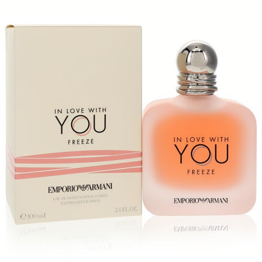 Giorgio Armani In Love With You Freeze 3.4 oz EDP. Elegant frosted peach bottle with a sleek silver cap, paired with its chic cream box.