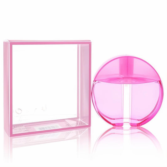 Benetton Inferno Paradiso Pink 3.4 oz EDT spray. Vibrant, round pink glass bottle with clear display packaging.