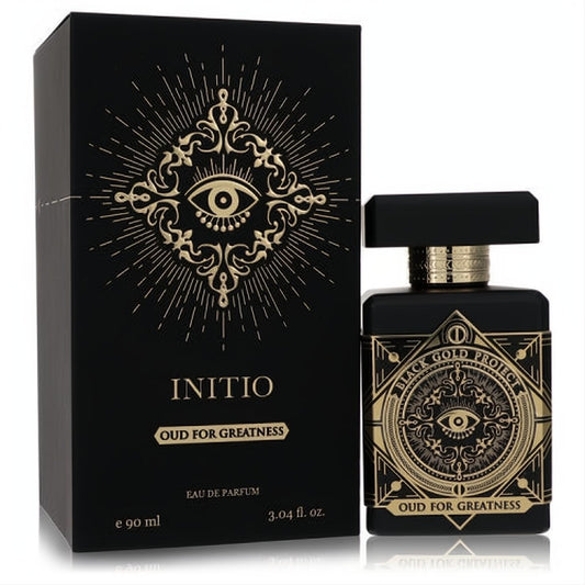 Mesmerizing Initio Oud For Greatness 3.04 oz EDP in a sleek black bottle with iconic gold eye design and ornate box.