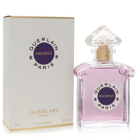 Experience Guerlain Insolence 2.5 oz EDP. Elegant clear glass bottle with light purple fragrance, ornate cap, and chic white box.