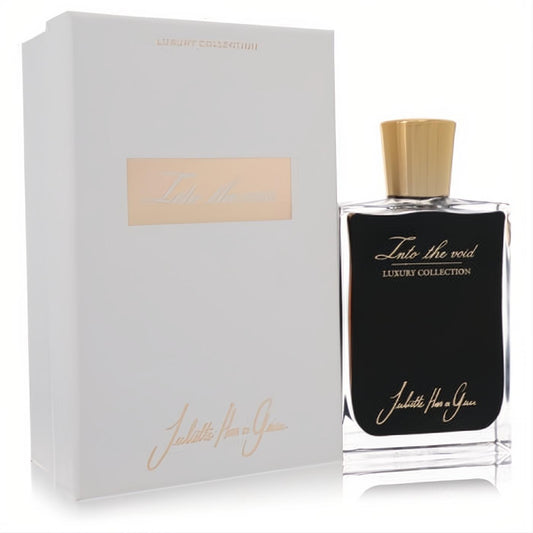 Juliette Has a Gun Into the Void 2.5 oz EDP. Sleek black bottle with gold accents and matching white luxury collection box.
