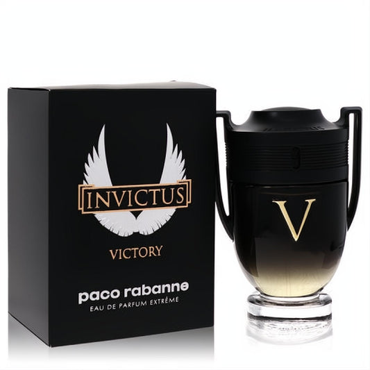 Invictus Victory Paco Rabanne men's EDP Extreme: a bold black and gold trophy bottle with 'V' logo and winged box.