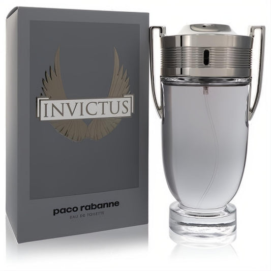 Paco Rabanne Invictus men's cologne. Striking trophy bottle with clear liquid, shiny silver details, and a sophisticated gray winged box.