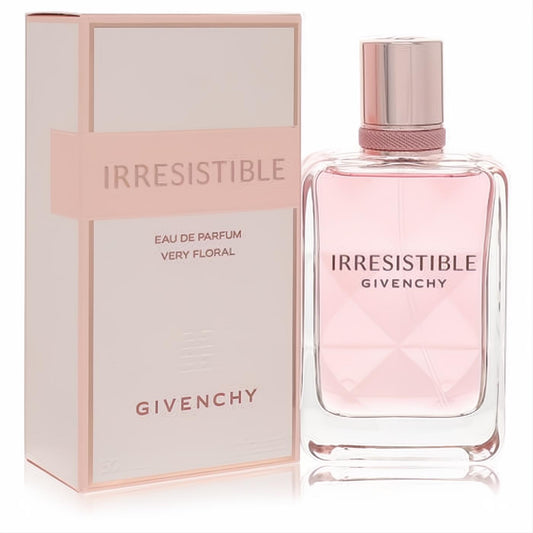 Irresistible Givenchy Very Floral Eau De Parfum 1.7 oz. Pink fragrance in a sleek glass bottle with rose gold cap, beside its elegant blush box.