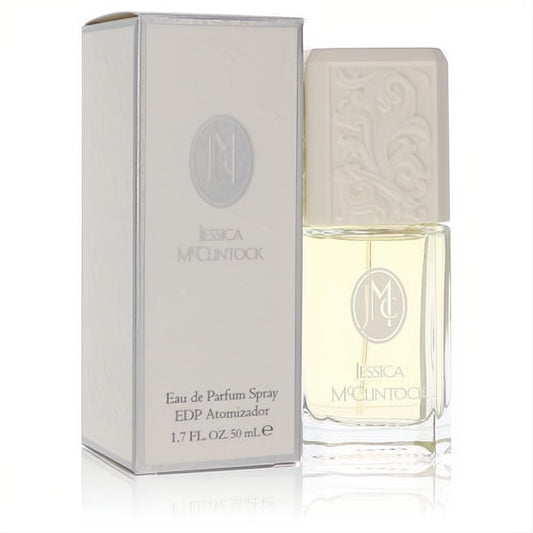 JESSICA McCLINTOCK 1.7 oz Eau De Parfum spray. Clear bottle with pale yellow fragrance, ornate cream cap, and elegant matching box.