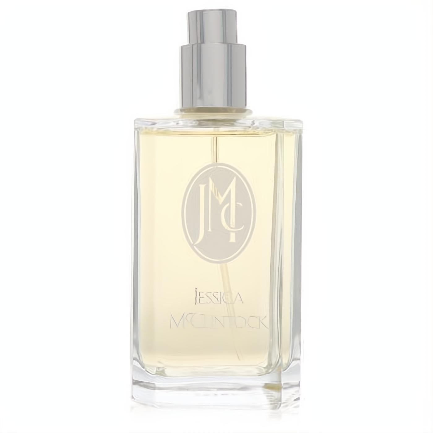 Sophisticated Jessica McClintock Eau De Parfum tester. Clear glass bottle, pale golden fragrance, silver cap, and signature JM monogram.